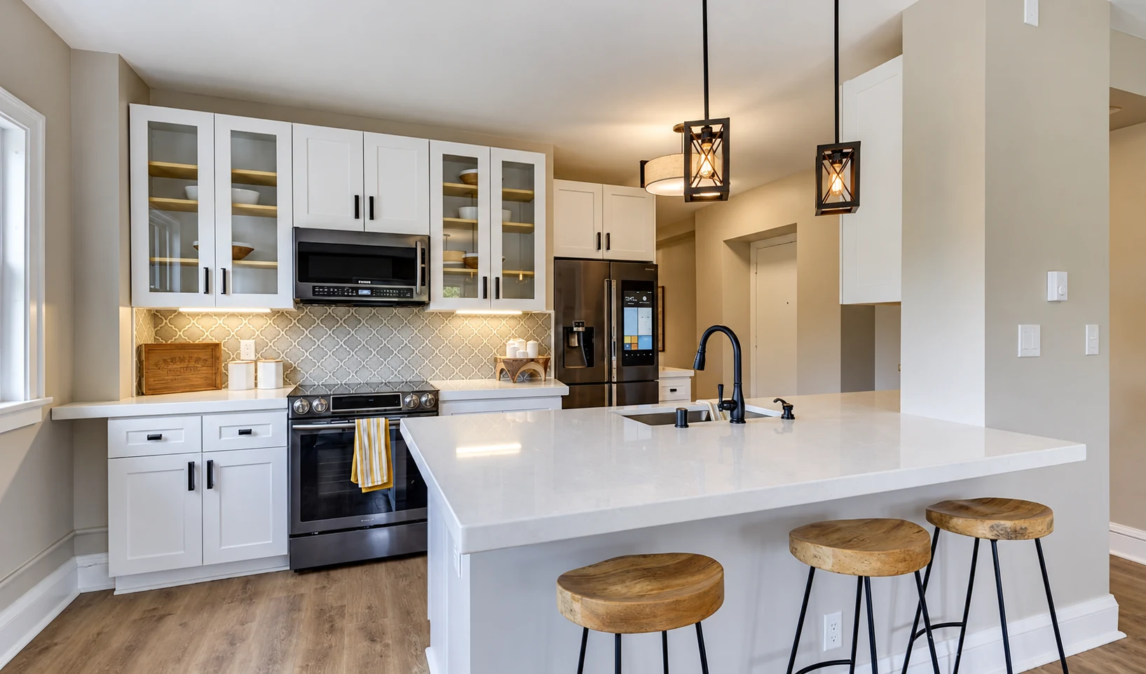 New cabinetry, island and finishes in the renovated 79 Western kitchen