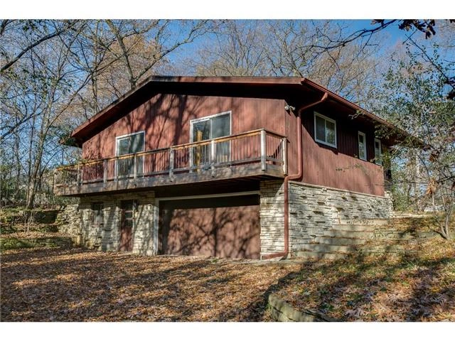 8132 Lea Road — exterior, before