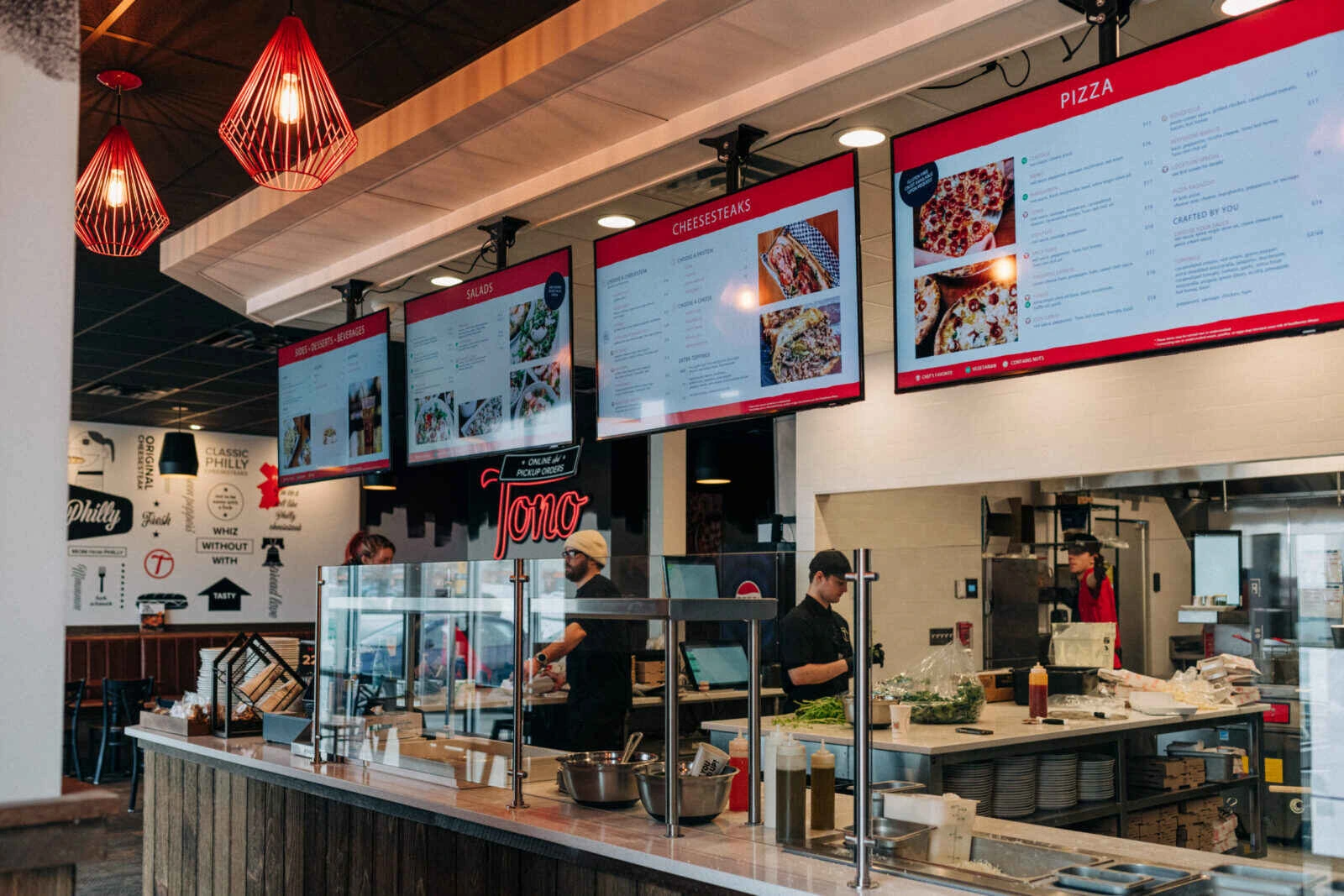 Tono restaurant interior with its service counter, open kitchen and menu displays