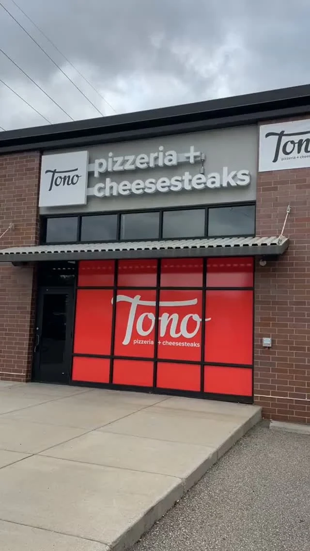 The Tono Pizzeria and Cheesesteaks storefront in Chanhassen, the opening frame of the KPS walkthrough reel
