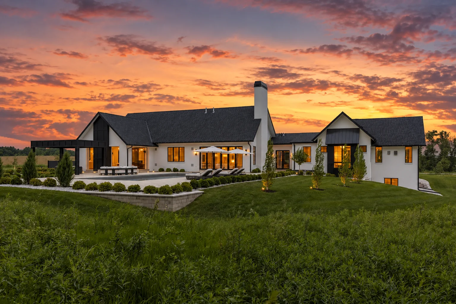 Villa Rococo custom home exterior at sunset
